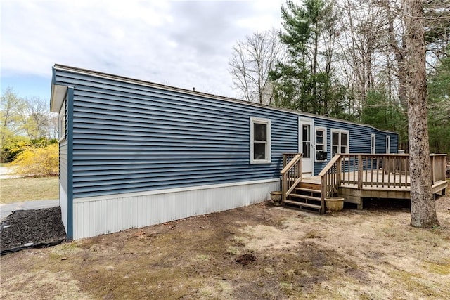 56 Park Ln, Coventry, RI 02816 - back of house with a wooden deck