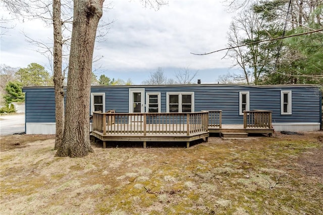 56 Park Ln, Coventry, RI 02816 - back of property with a wooden deck