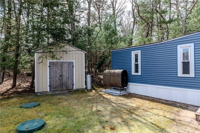 56 Park Ln, Coventry, RI 02816 - view of shed with heating fuel and view of scattered trees