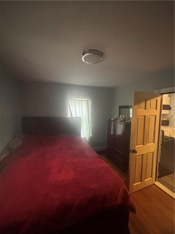 34 Lewis St, Central Falls, RI 02863 - bedroom featuring dark wood-style flooring