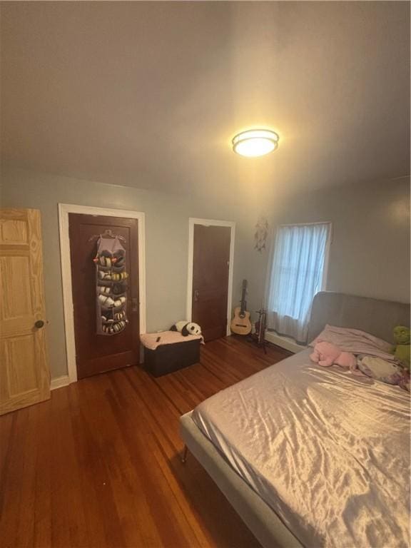 34 Lewis St, Central Falls, RI 02863 - bedroom featuring wood finished floors