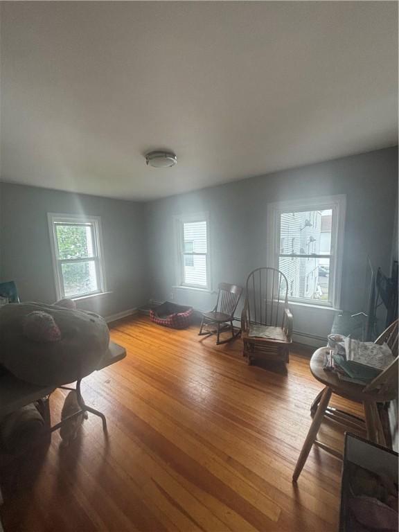 34 Lewis St, Central Falls, RI 02863 - sitting room featuring wood finished floors and baseboards