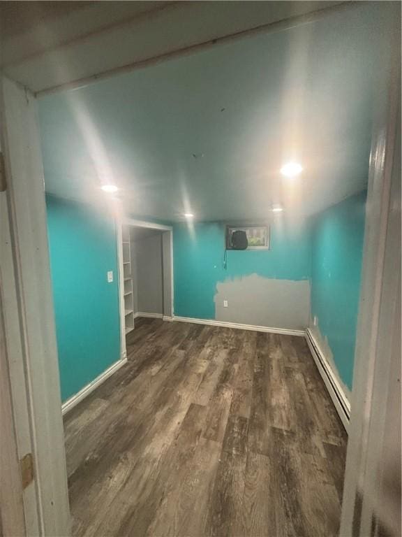 34 Lewis St, Central Falls, RI 02863 - unfurnished room with a baseboard heating unit and wood finished floors
