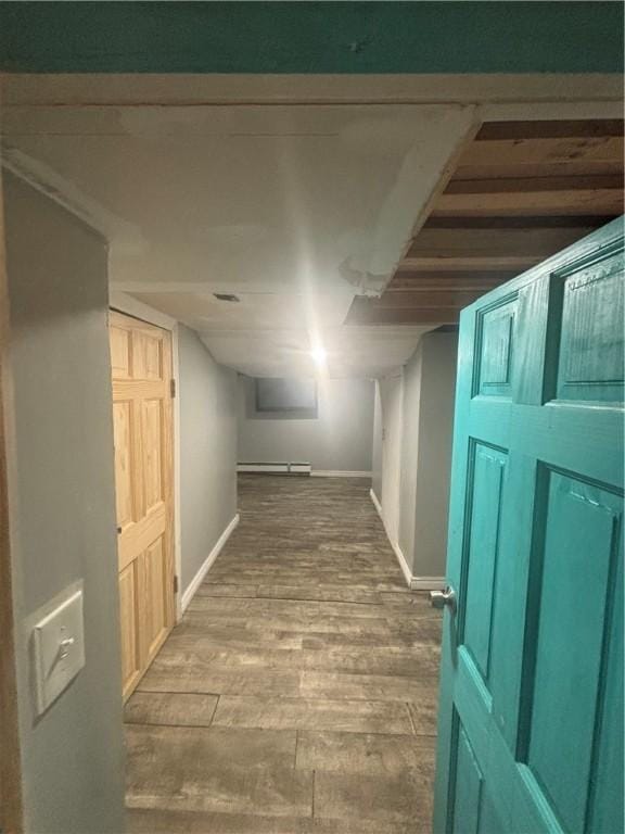 34 Lewis St, Central Falls, RI 02863 - corridor featuring baseboard heating and wood finished floors