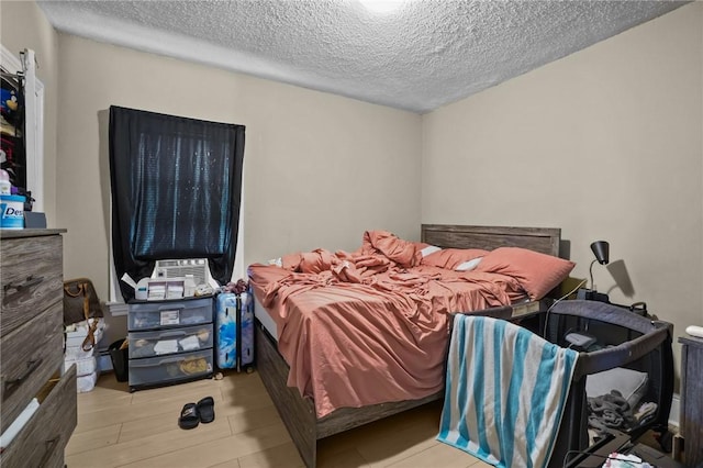 76 Slater St, Pawtucket, RI 02860 - bedroom featuring a textured ceiling