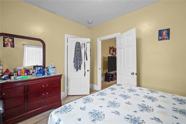 76 Slater St, Pawtucket, RI 02860 - bedroom featuring light wood-style floors and baseboards
