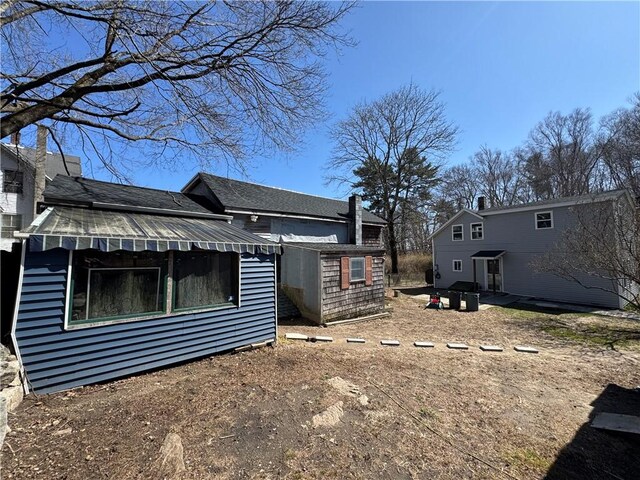 965 Main St, Hopkinton, RI 02832 - view of property exterior featuring a shed
