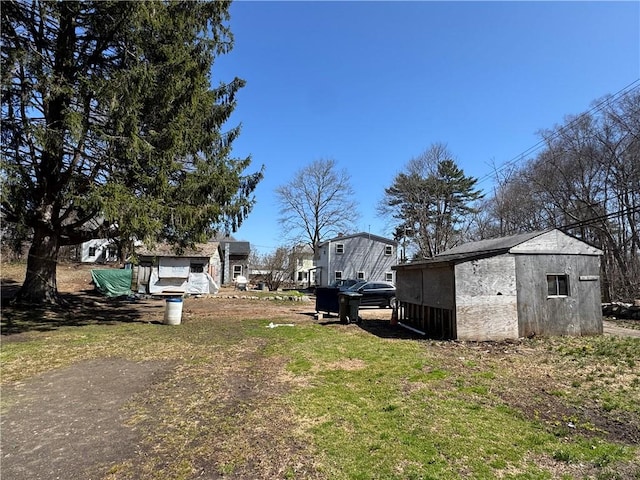 965 Main St, Hopkinton, RI 02832 - view of green lawn featuring a storage shed