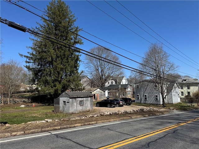 965 Main St, Hopkinton, RI 02832 - view of front of home featuring a residential view and a storage shed