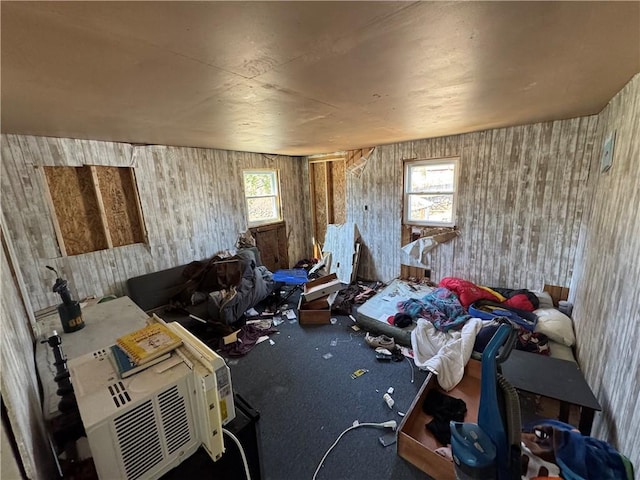 965 Main St, Hopkinton, RI 02832 - living room with carpet floors and wood walls
