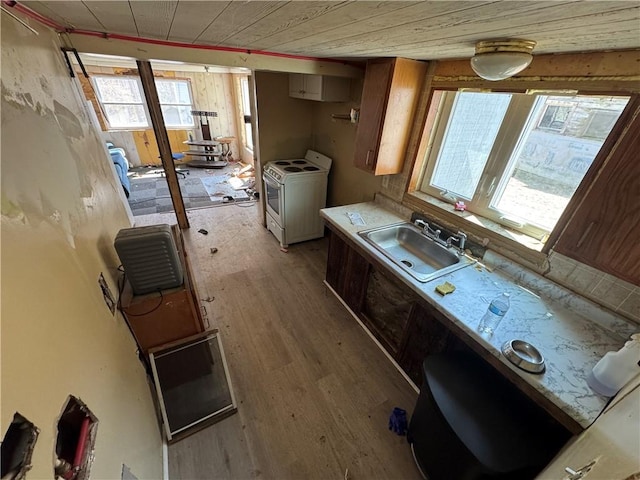 965 Main St, Hopkinton, RI 02832 - kitchen featuring washer / clothes dryer, light wood-style flooring, light countertops, and wood ceiling