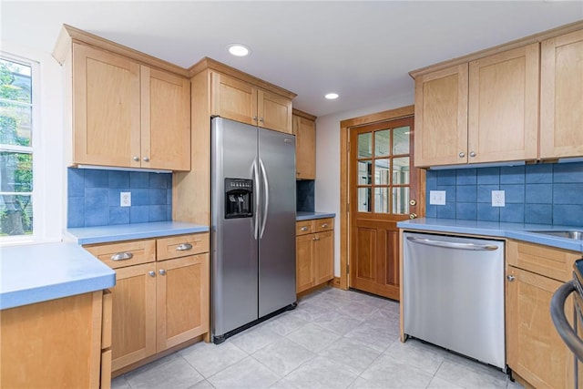 34 Pleasant St, North Kingstown, RI 02852 - kitchen featuring stainless steel appliances, backsplash, light countertops, light brown cabinets, and recessed lighting
