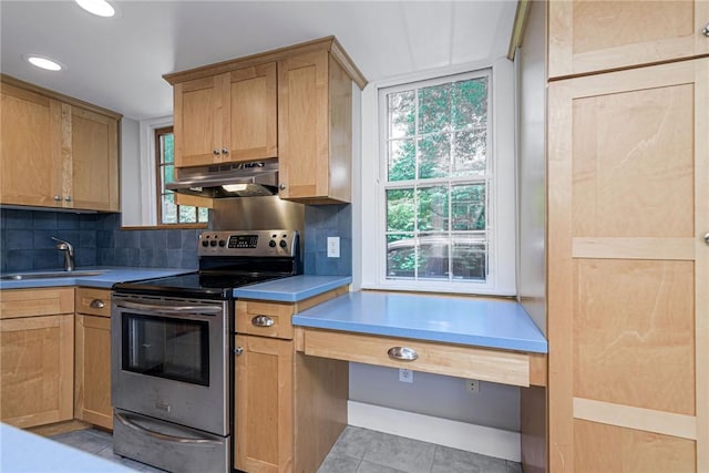 34 Pleasant St, North Kingstown, RI 02852 - kitchen featuring stainless steel range with electric stovetop, under cabinet range hood, backsplash, recessed lighting, and light tile patterned floors