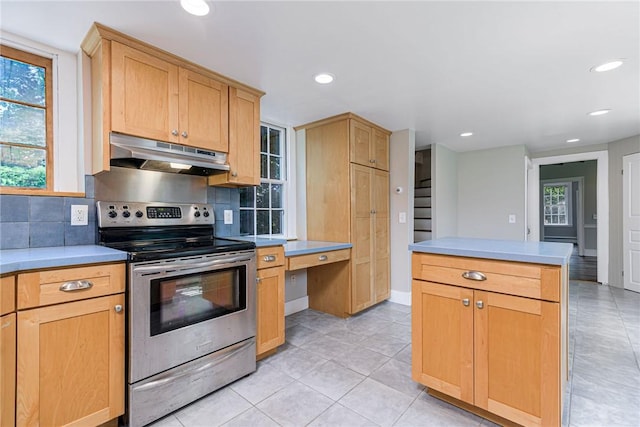 34 Pleasant St, North Kingstown, RI 02852 - kitchen with stainless steel electric range, under cabinet range hood, decorative backsplash, light brown cabinets, and recessed lighting