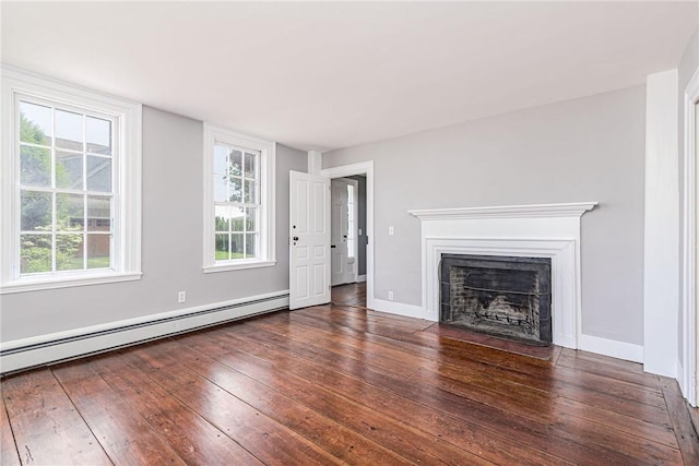34 Pleasant St, North Kingstown, RI 02852 - unfurnished living room with a baseboard radiator, a fireplace with flush hearth, and hardwood / wood-style floors