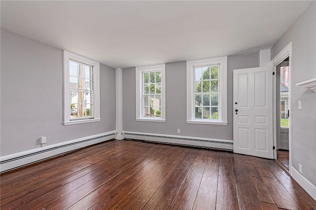 34 Pleasant St, North Kingstown, RI 02852 - foyer with baseboard heating, dark wood-style flooring, and healthy amount of natural light