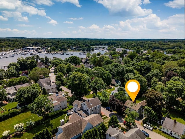34 Pleasant St, North Kingstown, RI 02852 - aerial perspective of suburban area with a nearby body of water and a heavily wooded area