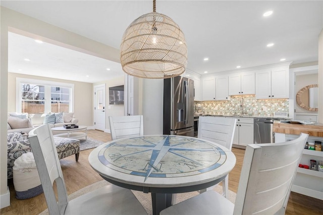 81 S Pier Rd, Narragansett, RI 02882 - dining room featuring wood finished floors and recessed lighting