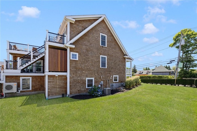 81 S Pier Rd, Narragansett, RI 02882 - view of property exterior with stairs and a yard