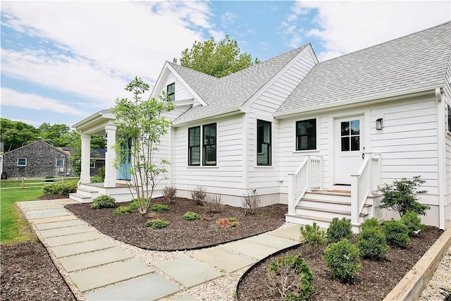 420 Long Hwy, Little Compton, RI 02837 - view of front facade featuring roof with shingles and entry steps