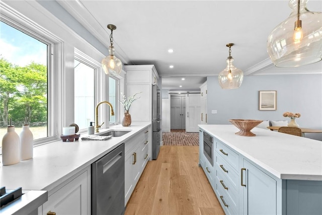 420 Long Hwy, Little Compton, RI 02837 - kitchen with stainless steel appliances, light countertops, white cabinets, ornamental molding, and light wood finished floors