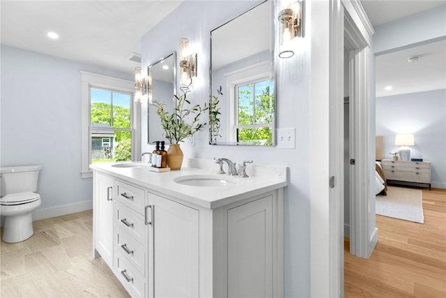 420 Long Hwy, Little Compton, RI 02837 - ensuite bathroom with double vanity, healthy amount of natural light, and recessed lighting