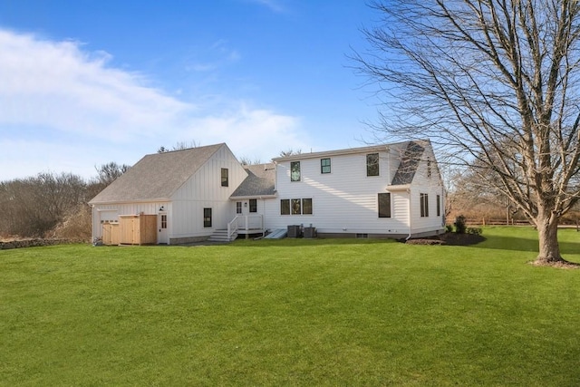 420 Long Hwy, Little Compton, RI 02837 - rear view of property featuring a lawn, board and batten siding, and roof with shingles