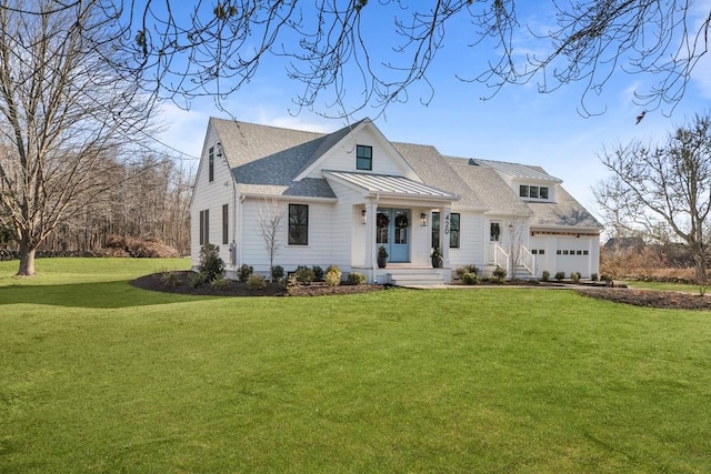 420 Long Hwy, Little Compton, RI 02837 - modern farmhouse style home featuring a front lawn, a shingled roof, a standing seam roof, and a garage