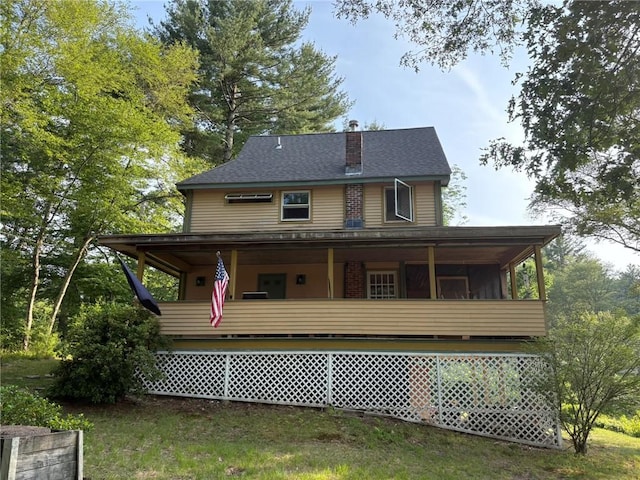 40 Anthony Rd, Foster, RI 02825 - back of house featuring a chimney and a porch