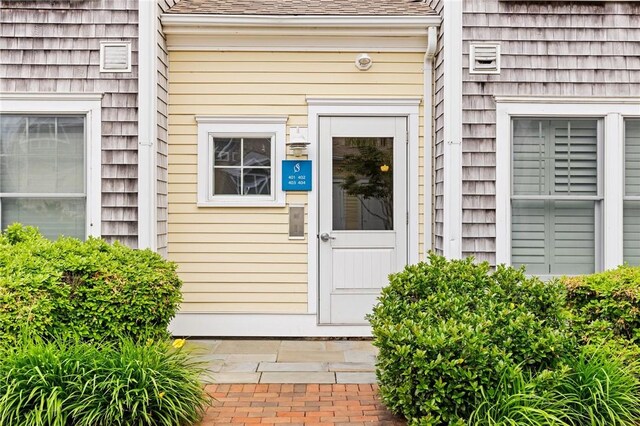 20 Narragansett Ave Unit 404, Narragansett, RI 02882 - entrance to property with a shingled roof