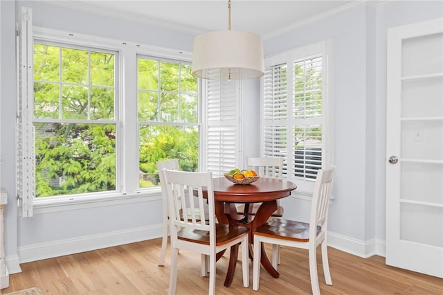 20 Narragansett Ave Unit 404, Narragansett, RI 02882 - dining space featuring crown molding and light wood-style floors