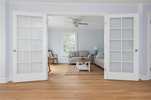 20 Narragansett Ave Unit 404, Narragansett, RI 02882 - living area featuring ornamental molding, a ceiling fan, and light wood-type flooring