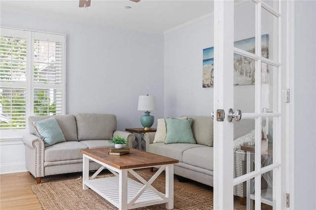 20 Narragansett Ave Unit 404, Narragansett, RI 02882 - living room featuring wood finished floors, crown molding, ceiling fan, and french doors