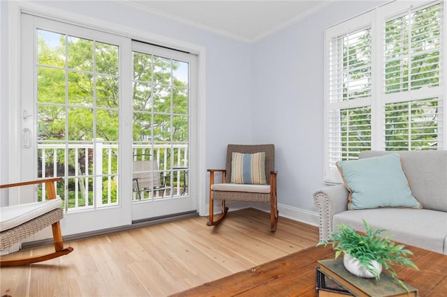 20 Narragansett Ave Unit 404, Narragansett, RI 02882 - sitting room featuring ornamental molding and wood finished floors