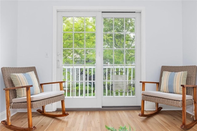 20 Narragansett Ave Unit 404, Narragansett, RI 02882 - living area with light wood finished floors and plenty of natural light