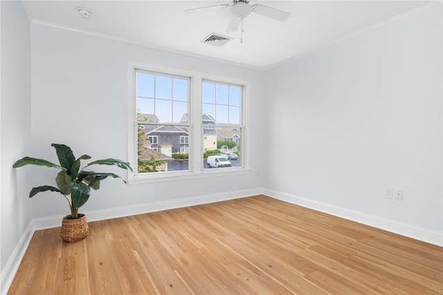 20 Narragansett Ave Unit 404, Narragansett, RI 02882 - empty room with ornamental molding, light wood-type flooring, a smoke detector, and a ceiling fan