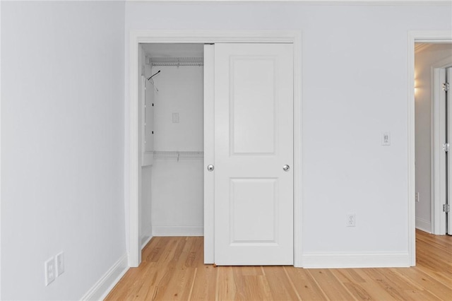 20 Narragansett Ave Unit 404, Narragansett, RI 02882 - unfurnished bedroom with a closet and light wood finished floors