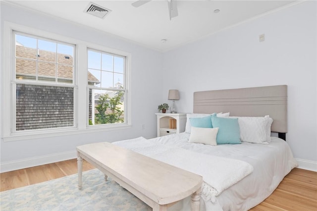20 Narragansett Ave Unit 404, Narragansett, RI 02882 - bedroom with wood finished floors and ceiling fan