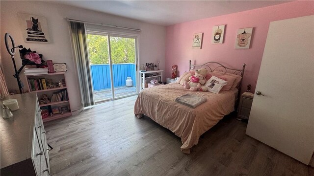 179 Wallace St, Providence, RI 02909 - bedroom featuring wood finished floors and access to outside