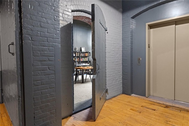 685 Social St Unit 114, Woonsocket, RI 02895 - hall featuring light wood-style flooring and elevator