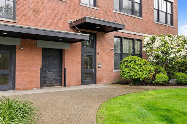 685 Social St Unit 114, Woonsocket, RI 02895 - entrance to property featuring brick siding