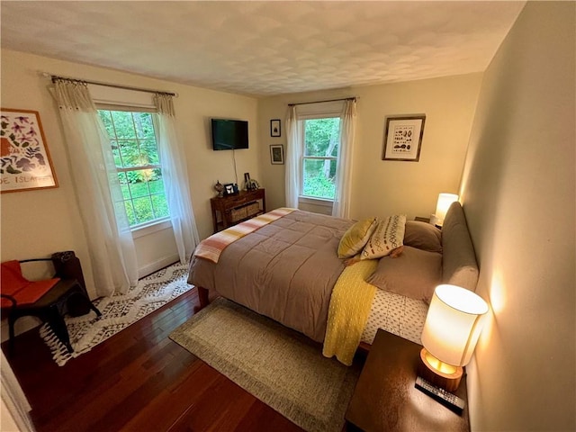 10 Lakeside Dr, Charlestown, RI 02813 - bedroom with wood finished floors and multiple windows