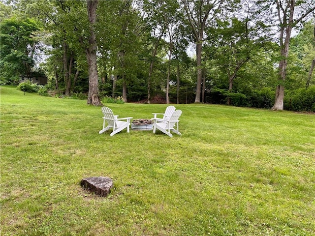 10 Lakeside Dr, Charlestown, RI 02813 - view of grassy yard featuring an outdoor fire pit