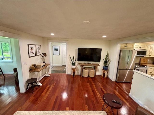 10 Lakeside Dr, Charlestown, RI 02813 - living area with dark wood-style floors and recessed lighting