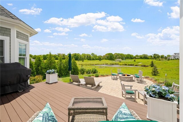 155 E Matunuck Farm Dr, South Kingstown, RI 02879 - wooden terrace with a fire pit, a grill, a water view, and a patio