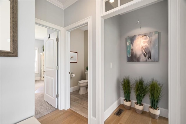 155 E Matunuck Farm Dr, South Kingstown, RI 02879 - corridor with wood finished floors and crown molding
