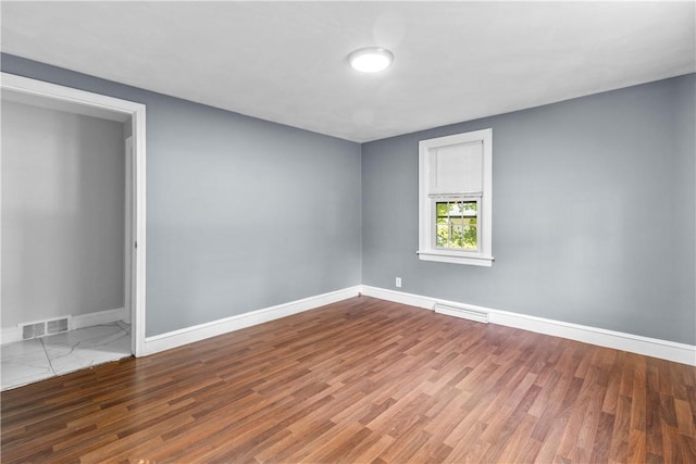 211 Tiogue Ave, Coventry, RI 02816 - spare room with wood finished floors