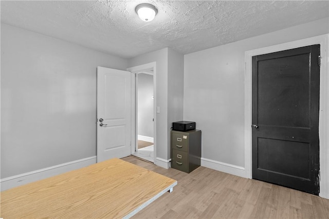 211 Tiogue Ave, Coventry, RI 02816 - unfurnished office with wood finished floors and a textured ceiling