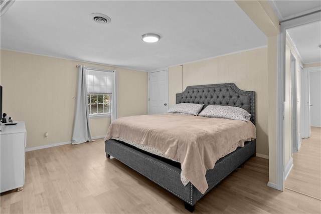 211 Tiogue Ave, Coventry, RI 02816 - bedroom featuring light wood-style flooring and crown molding