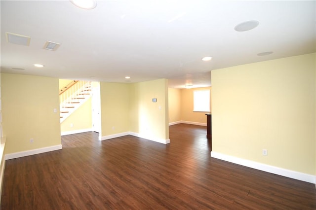 92 Trout Dr, Middletown, RI 02842 - spare room with stairs, dark wood-style flooring, and recessed lighting